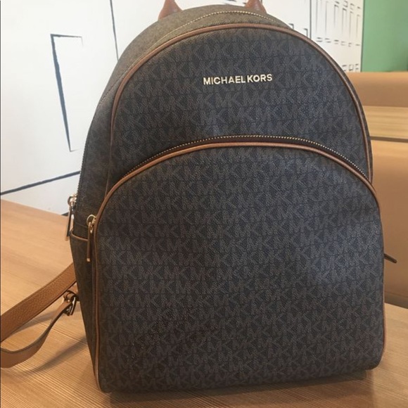 mk brown backpack